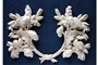  Ornamental woodcarving and ornaments in wood for furniture and panelling in the style of Grinling Gibbons. Foliage carving in limewood , historical and period style high-relief woodcarving in limewood.  