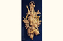  Ornamental woodcarving and ornaments in wood for furniture and panelling in the style of Grinling Gibbons. Foliage carving in limewood , historical and period style high-relief woodcarving in limewood.