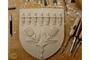 Blason  en bois sculpte